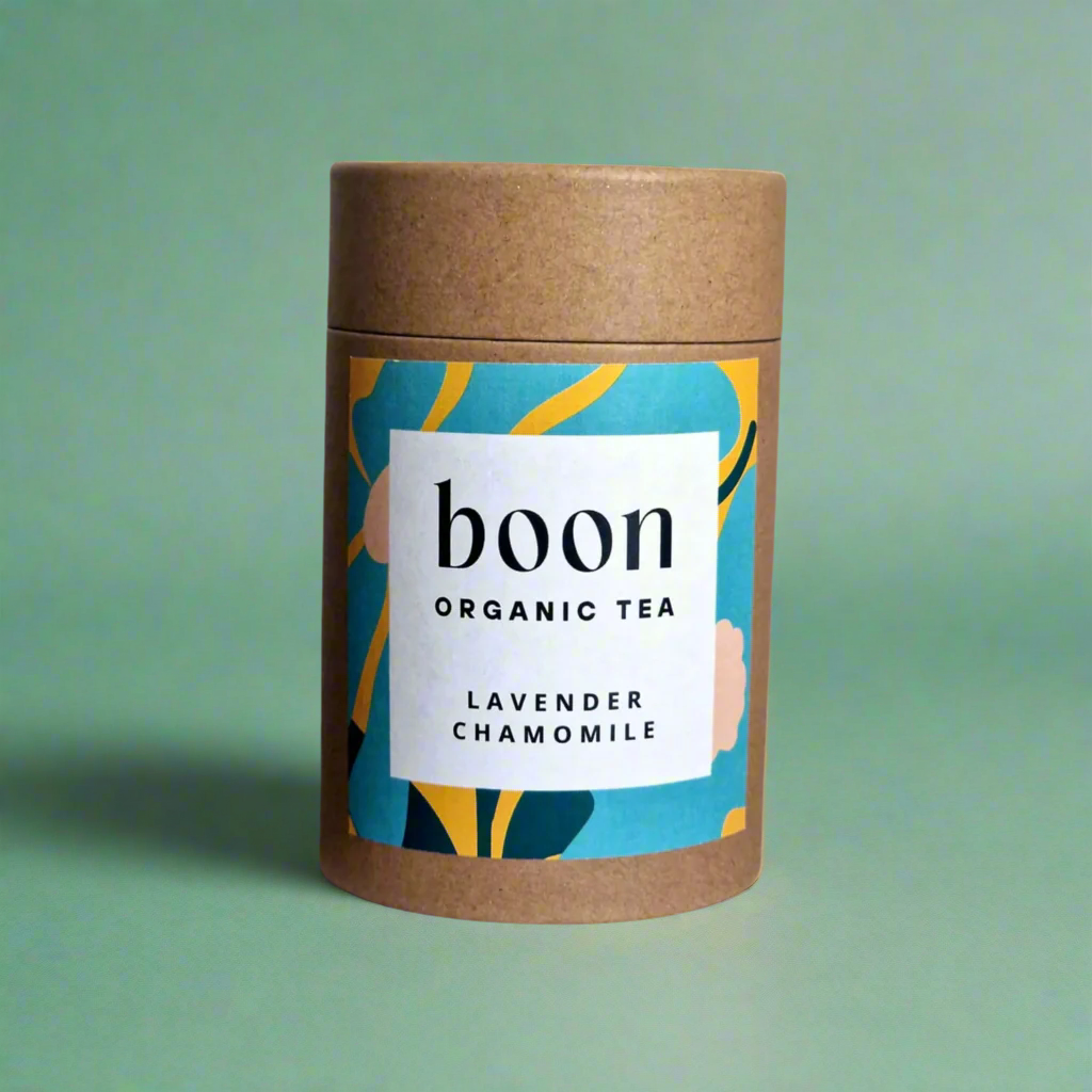Boon Organic Tea lavender chamomile organic teacontainer with colorful label on a purple background