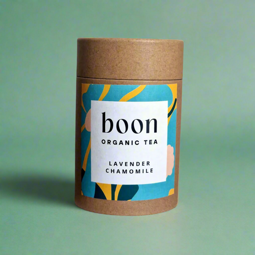 Boon Organic Tea lavender chamomile organic teacontainer with colorful label on a purple background