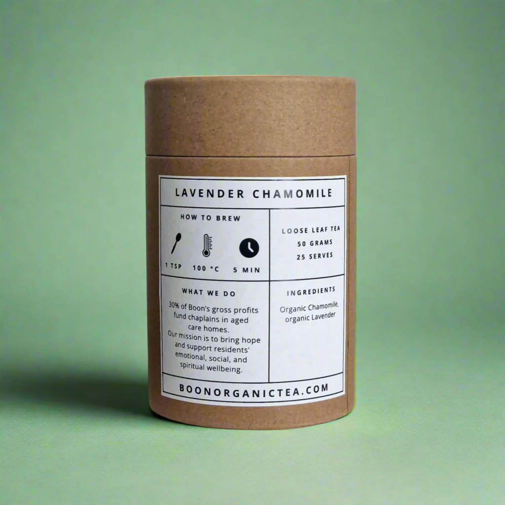 Cardboard tea canister lavender chamomile organic tea with a label on a green background